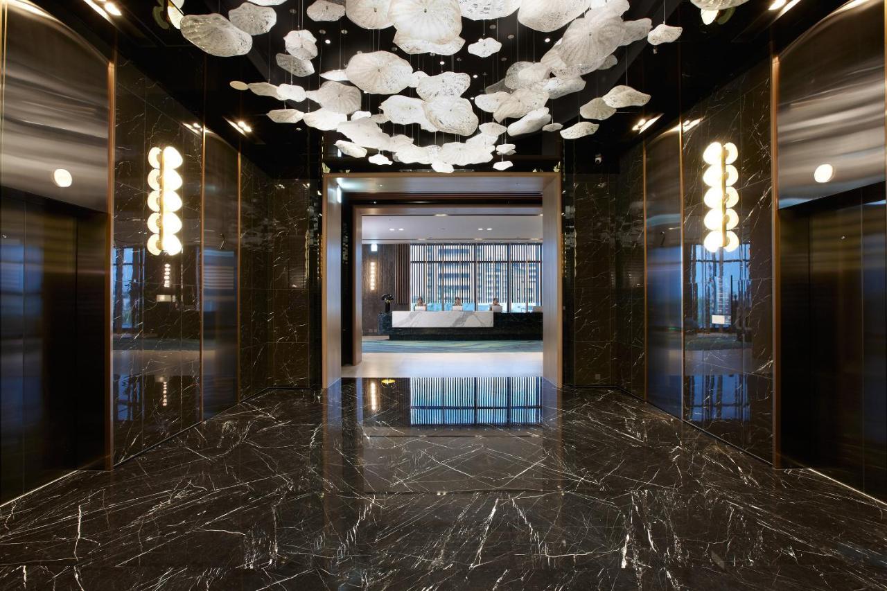 Cozzi Blu Hotel Zhongli Bagian luar foto Lobby
