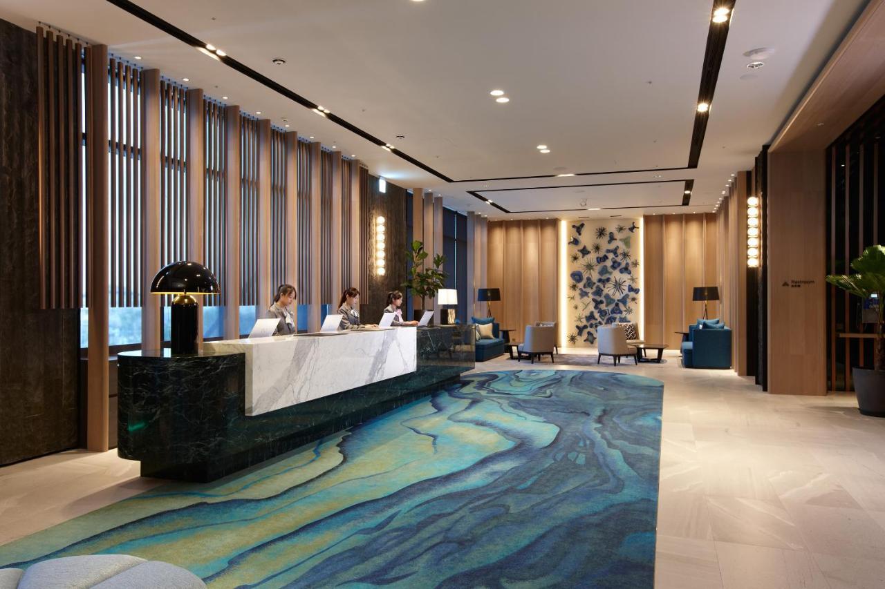 Cozzi Blu Hotel Zhongli Bagian luar foto Lobby