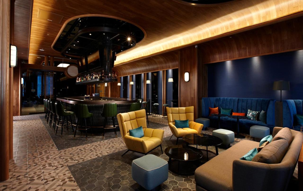 Cozzi Blu Hotel Zhongli Bagian luar foto The lounge at the airport
