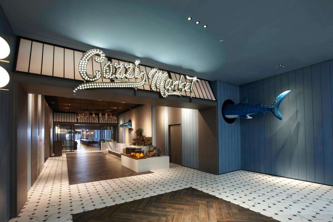 Cozzi Blu Hotel Zhongli Bagian luar foto Entrance to the restaurant