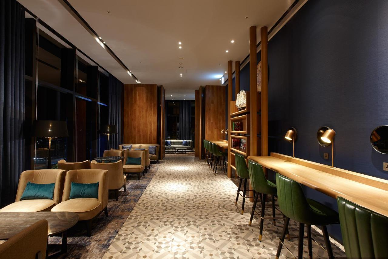 Cozzi Blu Hotel Zhongli Bagian luar foto The library at the hotel